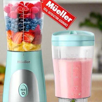 Mueller personal blender with 15 oz travel cup and secure lid, shown on kitchen counter.